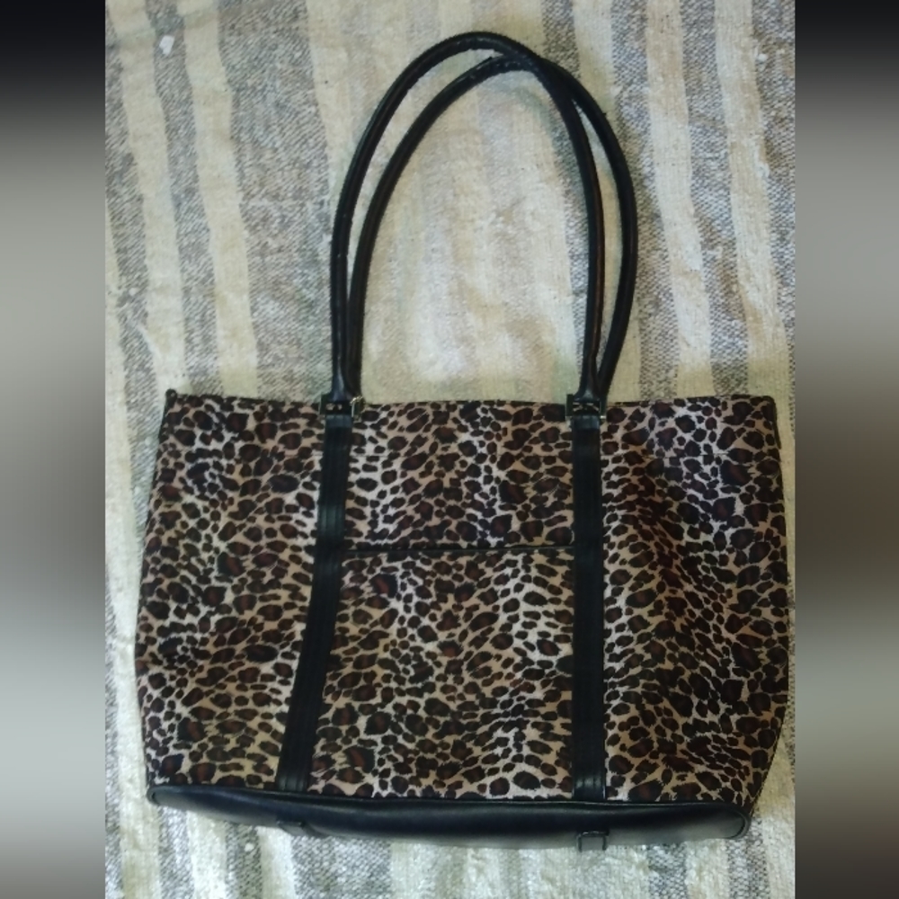 Romae cheetah print purse